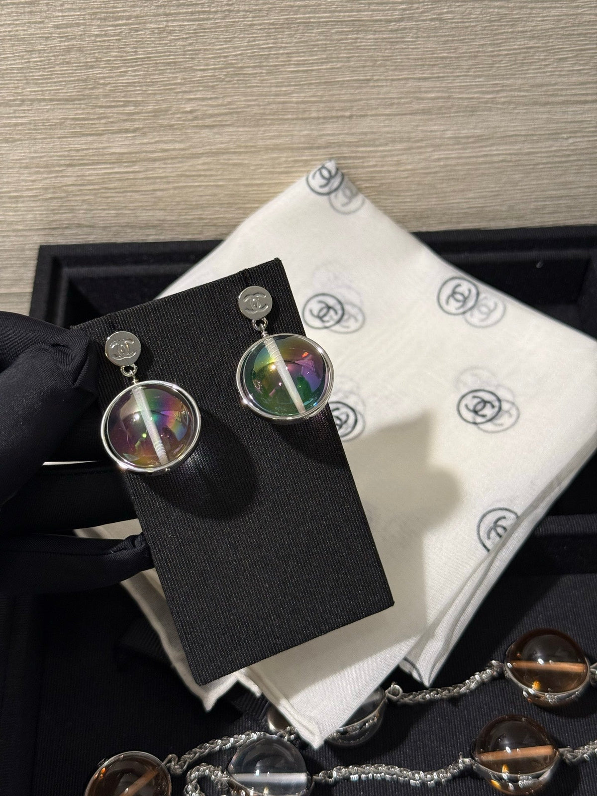 Chanel 2026 Transparent Iridescent Crystal Ball Planet Silver Button Double C Earrings